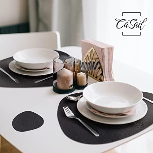 Casail Faux Falemats and תחתיות - סט של 4 מחצלות שולחן שחורות מודרניות עגולות לאוכלים - מחצלת עמידה בפני חום, אטום למים ולא מחלקה למקום
